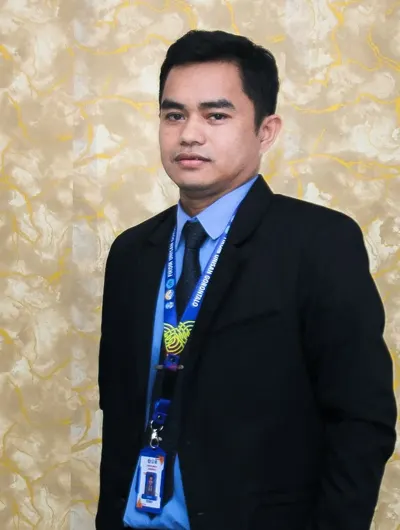 Husdi, M.Kom